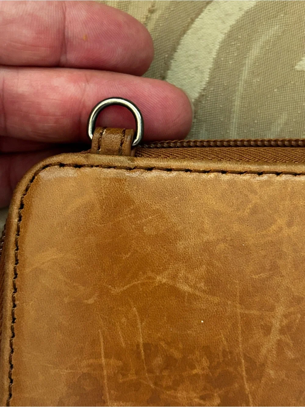 The Sak Smartphone Wristlet Wallet Iris Tobacco Brown Flower Embossed